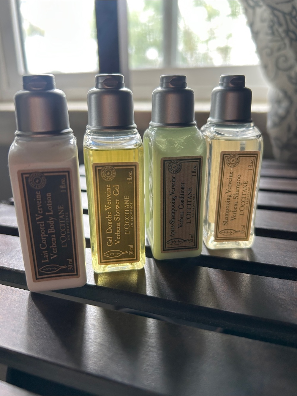 L'Occitane travel set (shampoo, conditioner, shower gel, body lotion)